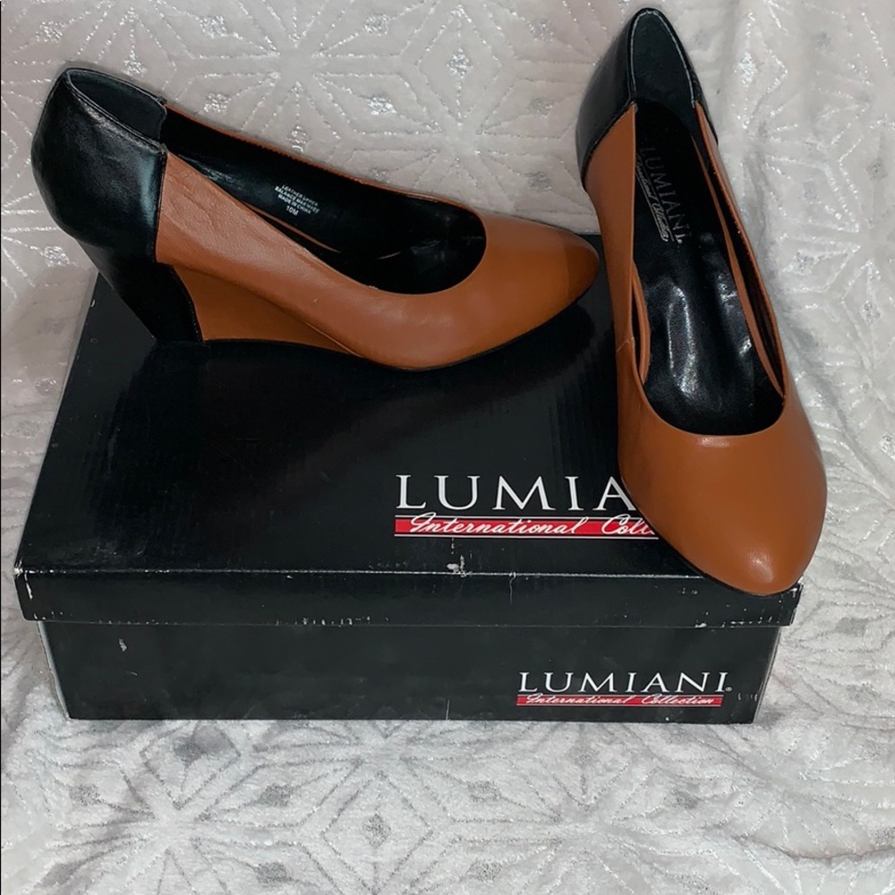 Tan and black Lumiani Wedges.
